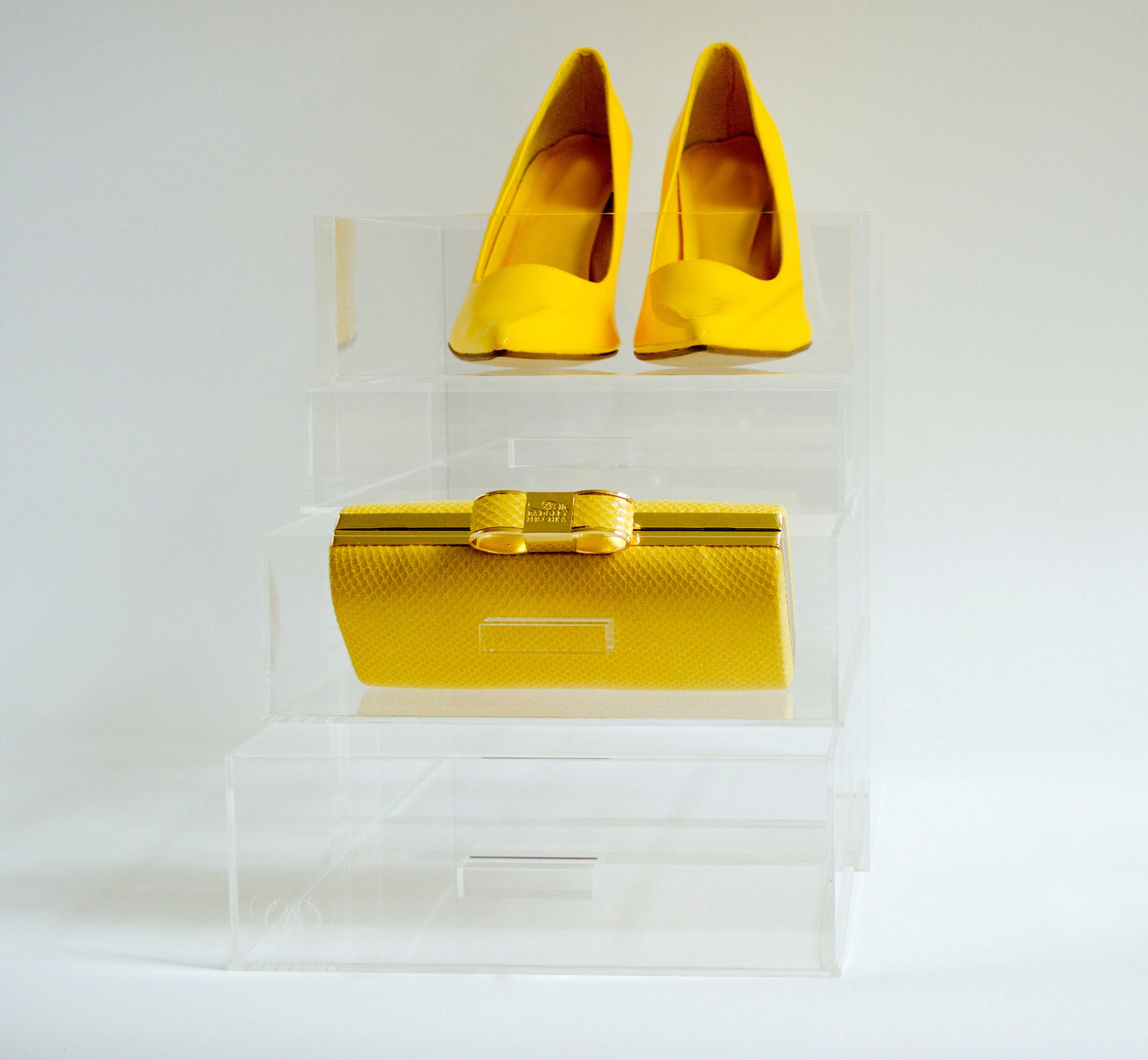 Acrylic Makeup Organizer with yellow purse and shoes